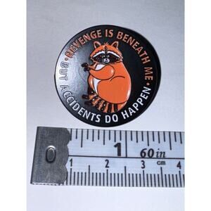 Revenge is beneath me but accidents do happen raccoon pin brooch